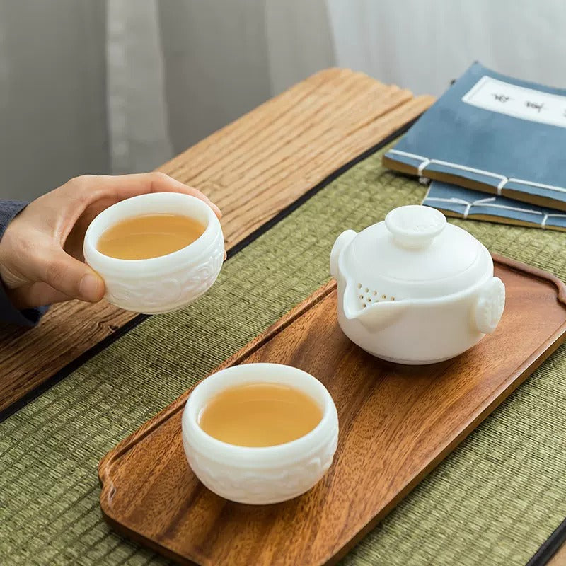 What types of tea are suitable for brewing with Mutton fat jade porcelain tea ware