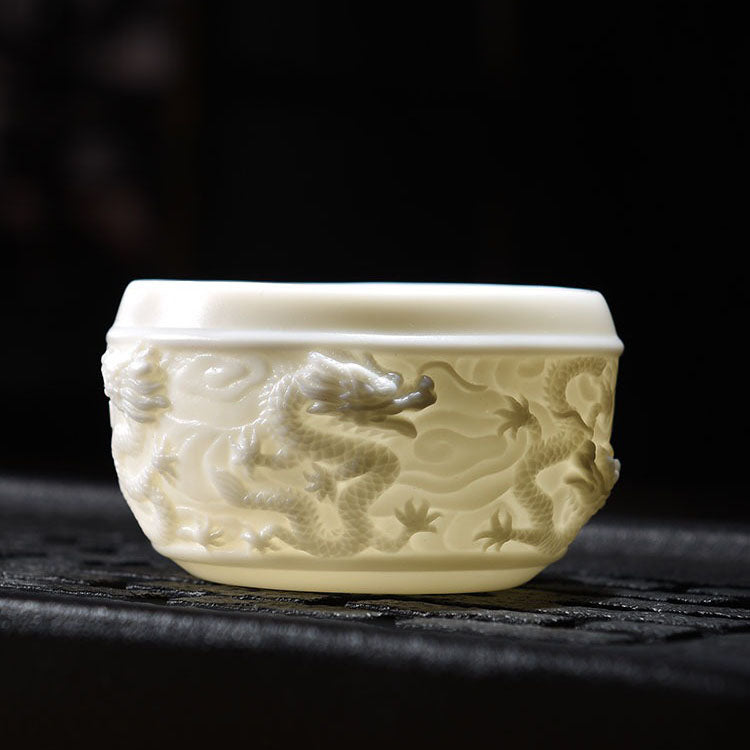 Appreciating The Exquisite Relief Craftsmanship On The Mutton Fat Jade Porcelain Tea Set